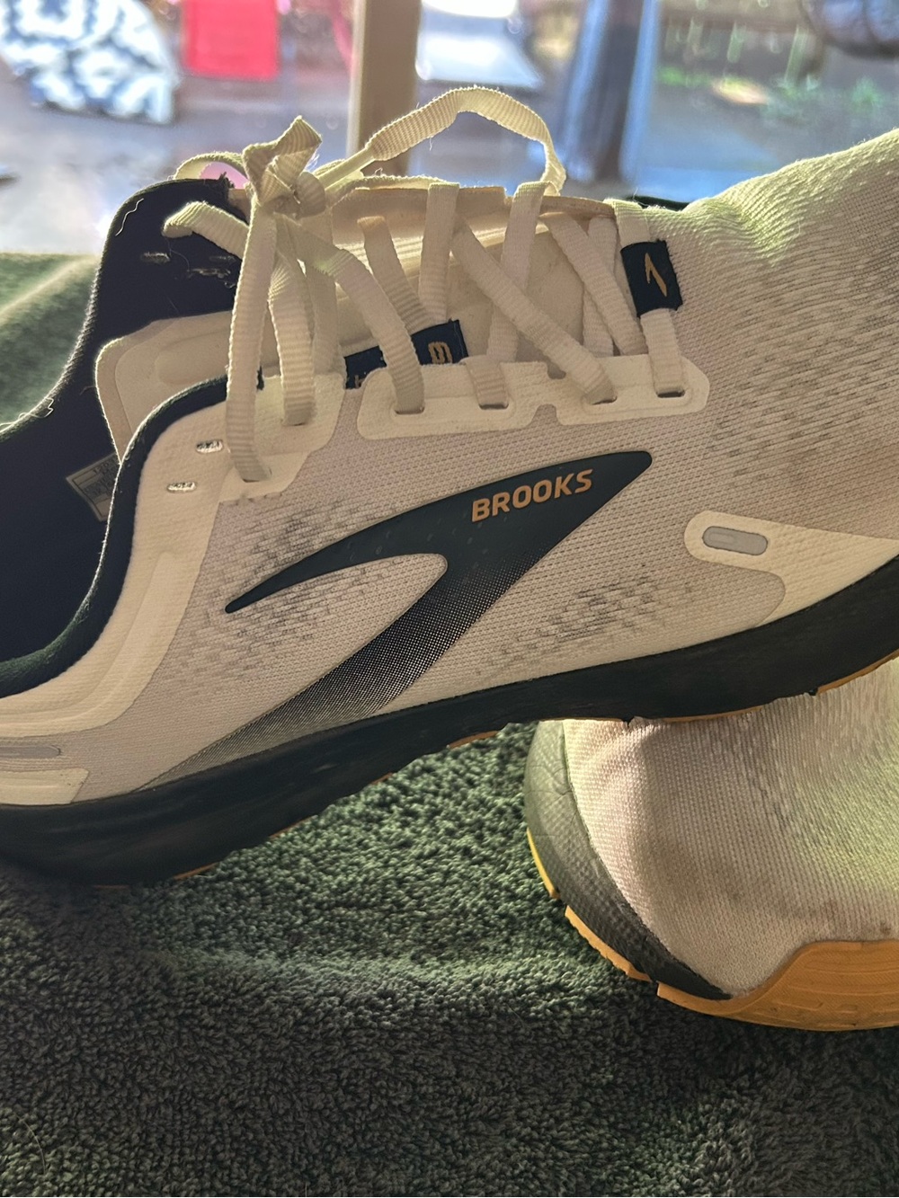 Brooks Women's White and Black Athletic Running Shoes with Yellow Accents